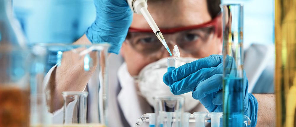 Biomedical Air Freight scientist working with pipette and pcr tube in chemical lab